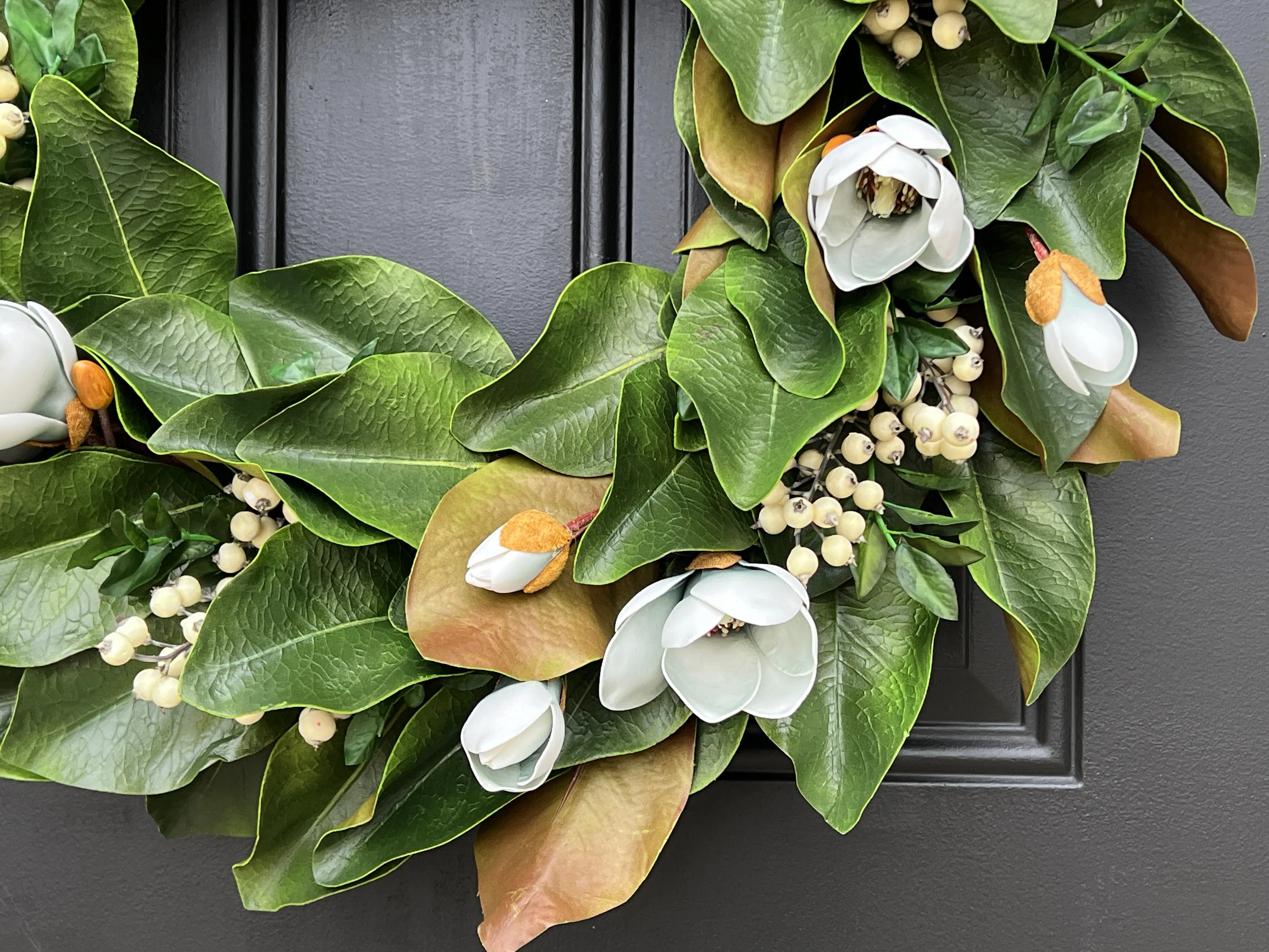 Blue Magnolia Wreath with Blue Berries and Brown Linen Ribbon